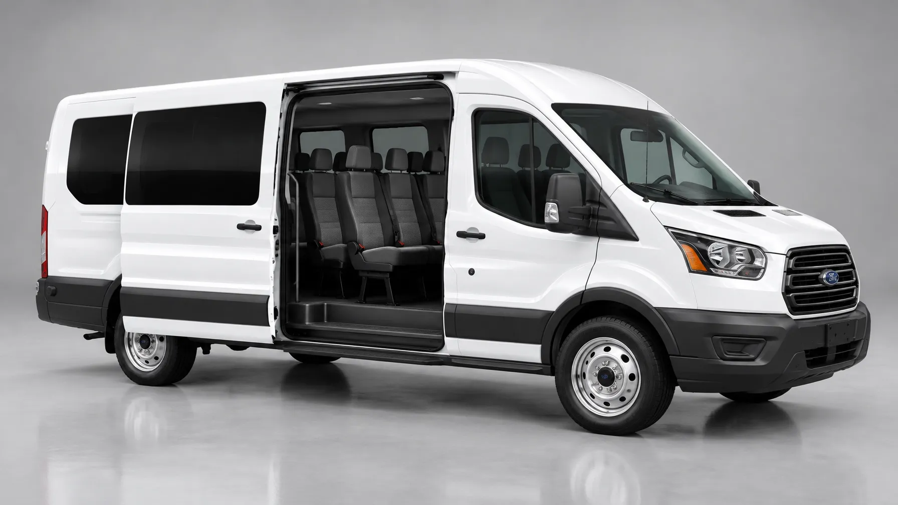 White 2023 Ford Transit 11-passenger van with its sliding door open and gray seating rows visible for group travel